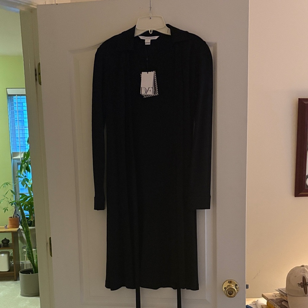 Diane Von Furstenberg Classic Black Long Sleeve wrap Dress.  Never worn.